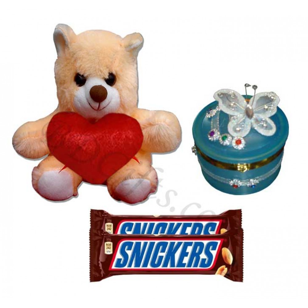 Teddy bear, jewelry box and chocolates