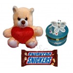Teddy bear, jewelry box and chocolates