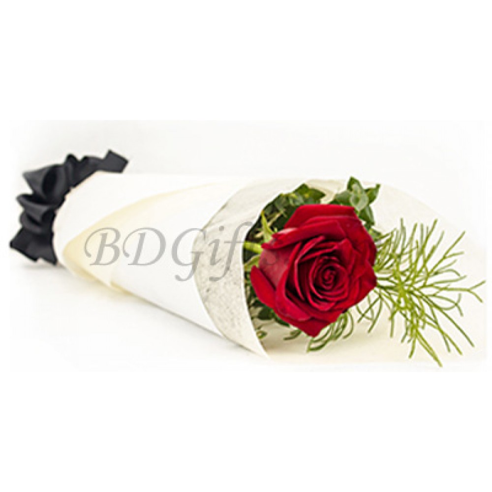 single red rose with green leaves in a bouquet