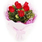 Fresh red roses in bouquet