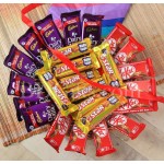 Kitkat, dairy milk and 5 star chocolates in basket