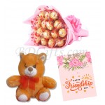 Bear with chocolates and card