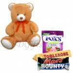 Teddy bear with chocolates and candy