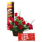 Roses in basket with chocolates and chips