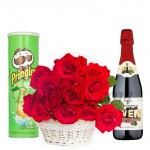 Roses in basket with sparking juice and chips