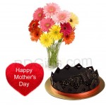Cake with pillow and gerberas in vase