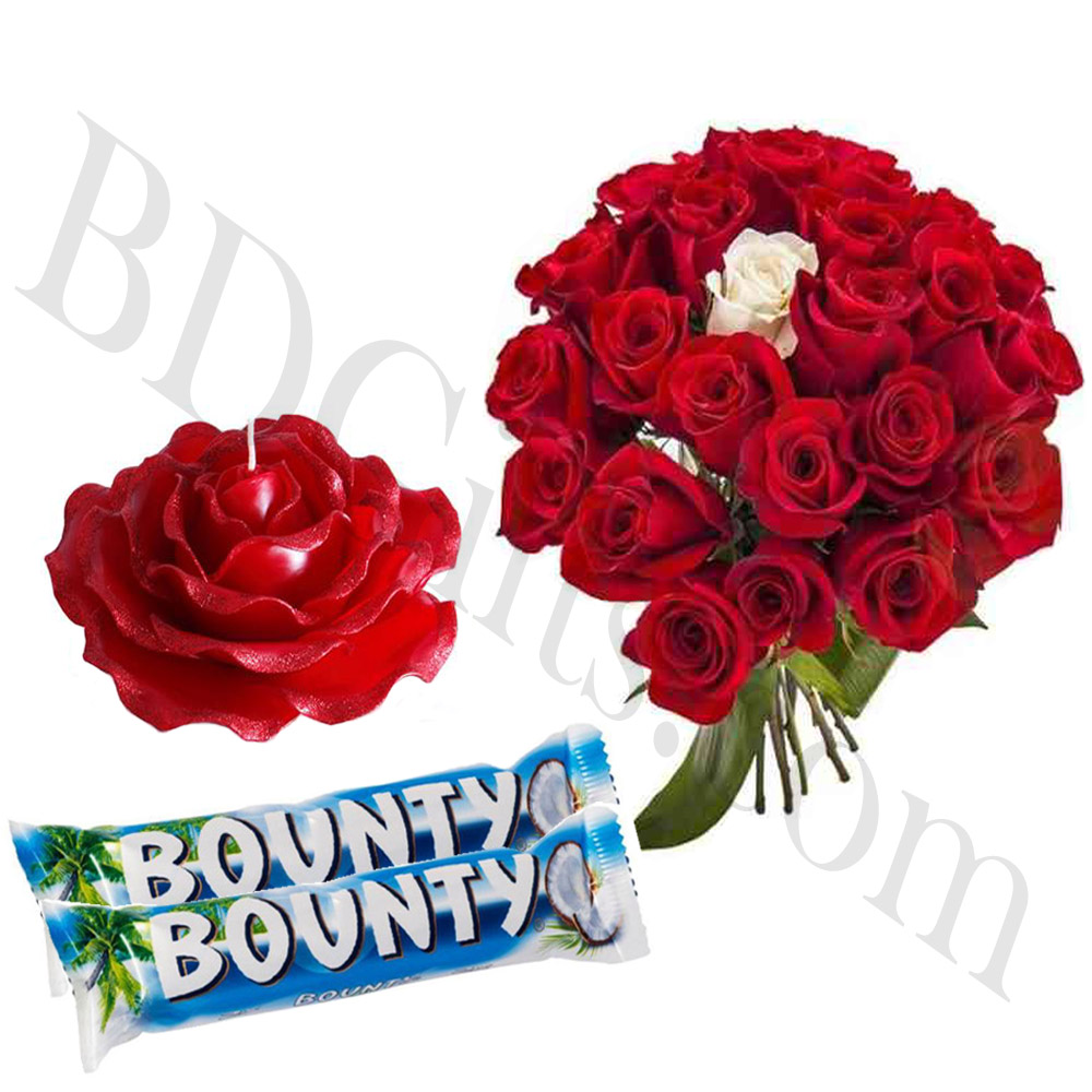 red roses with chocolates and candle