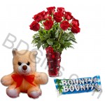 Teddy bear with roses and chocolates
