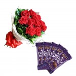 Fresh roses with chocolates